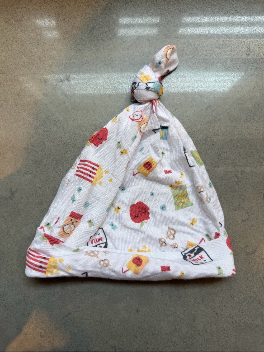 Milkberry 0-6m Baby Knot Hat in White with Colorful Snack Print